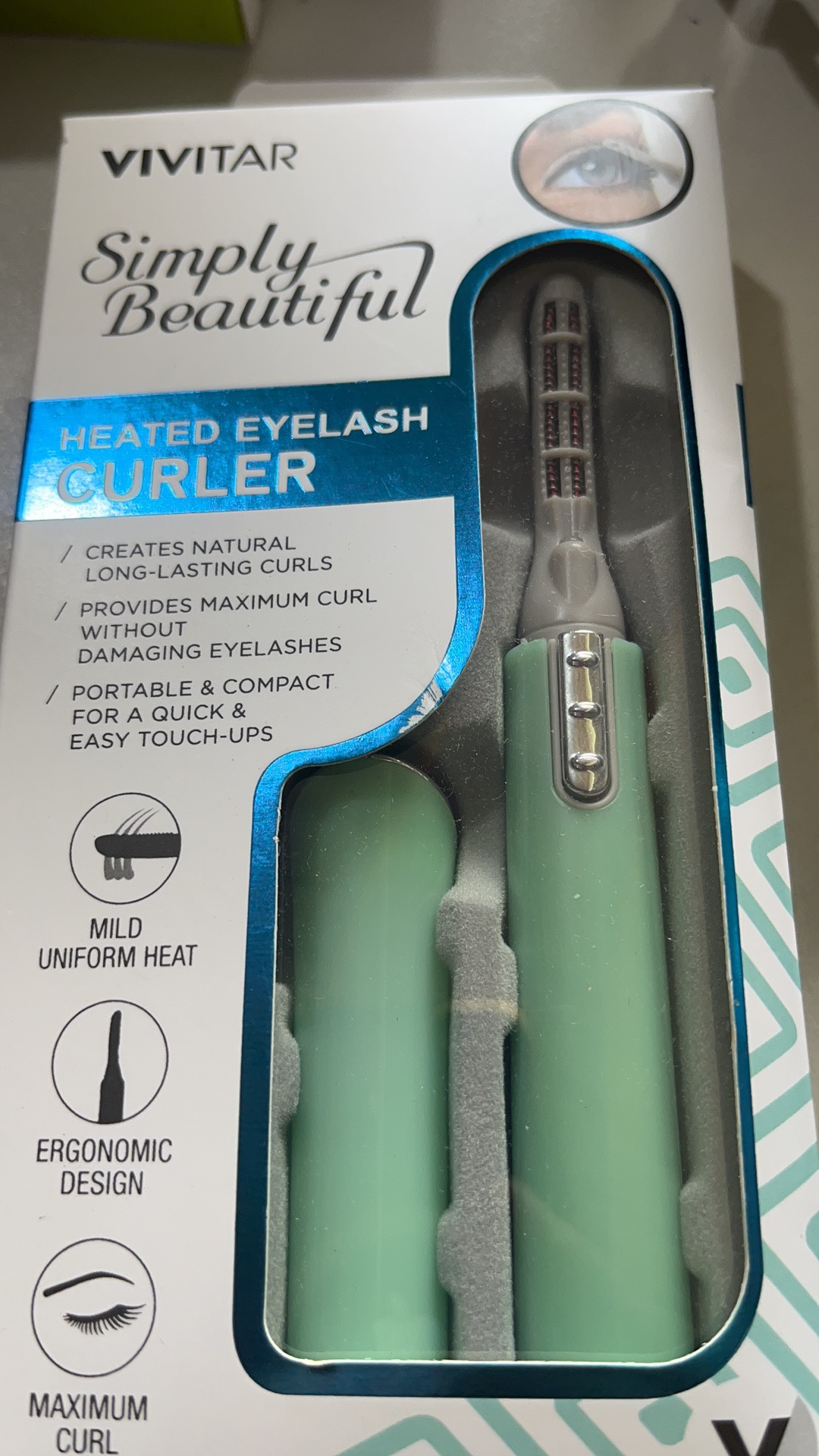 heated eyelash curler